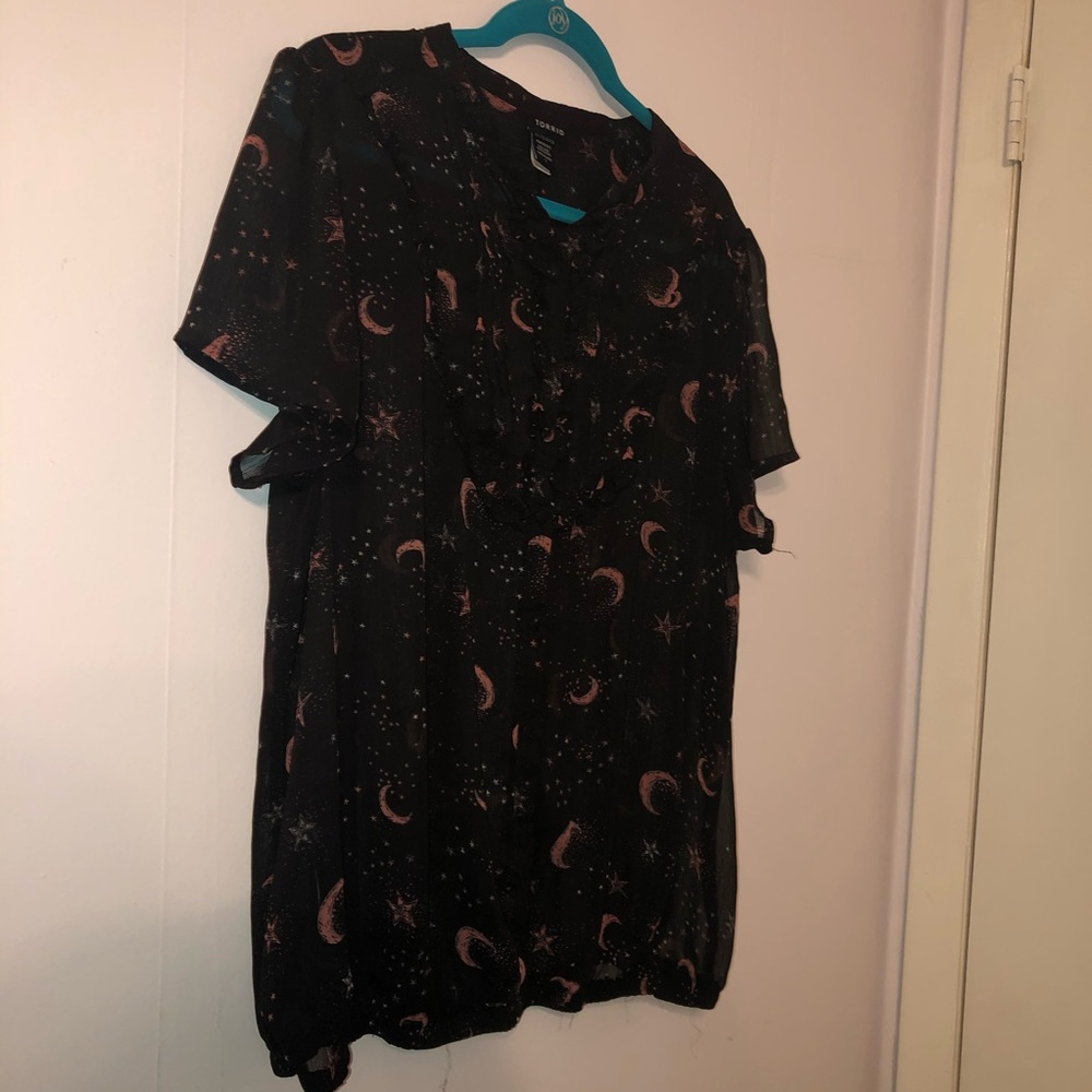Sheer Torrid moon/star printed top. Elastic bottom